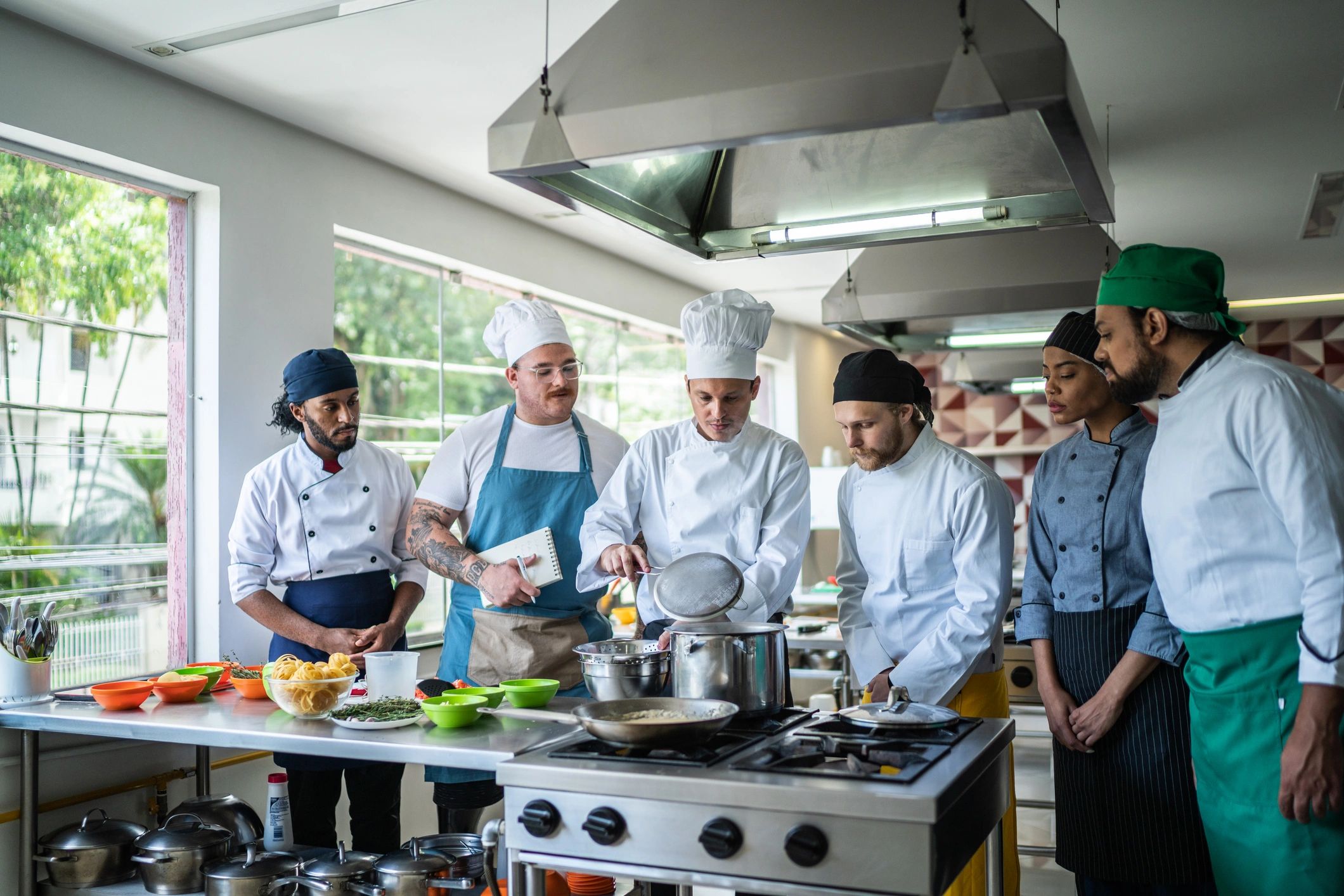 Chef teaching students during a cooking class